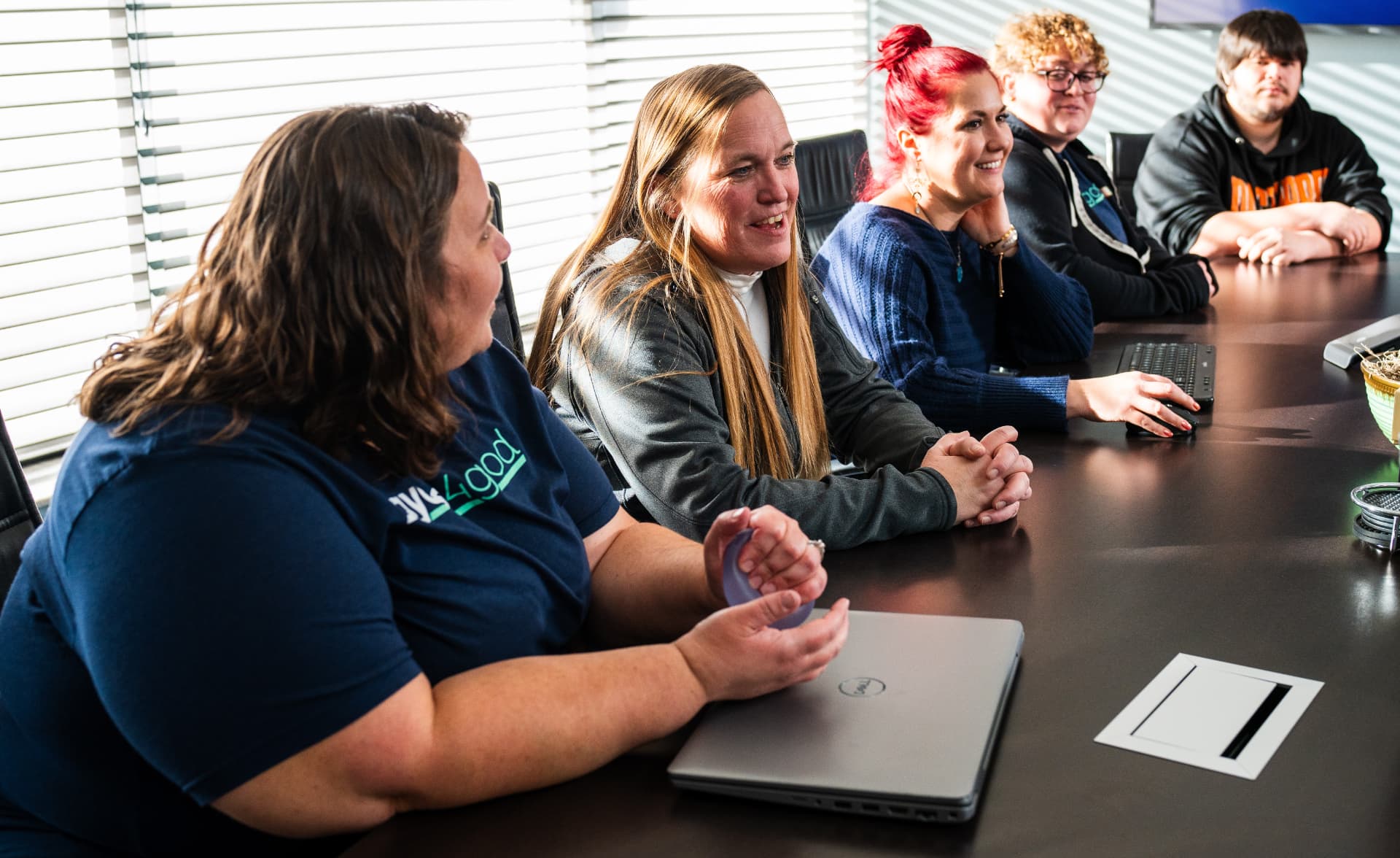 Daycos team collaborating on relocation financial operations